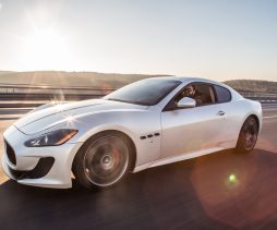 silver-sport-car-with-driver-highway